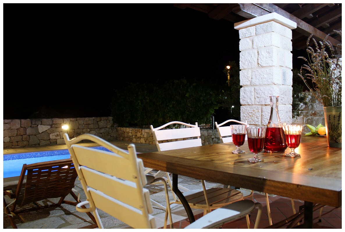 Outdoor dining terrace at night
